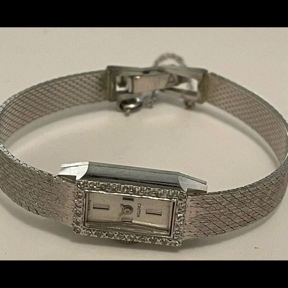 14k Gold and diamond watch